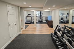 All Phase Electric LLC | Finished basement gym lit with recessed LED downlights | Southern NH
