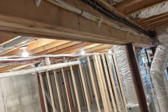 All Phase Electric LLC | Basement rough-in wiring run and stapled along the floor joists | Southern NH