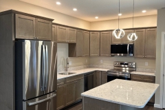 All Phase Electric LLC | Kitchen wired with recessed lighting and pendant lights over the island | Southern NH