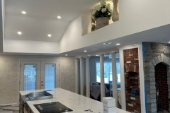 All Phase Electric LLC | Vaulted kitchen ceiling laid out with recessed lighting above a large island | Southern NH