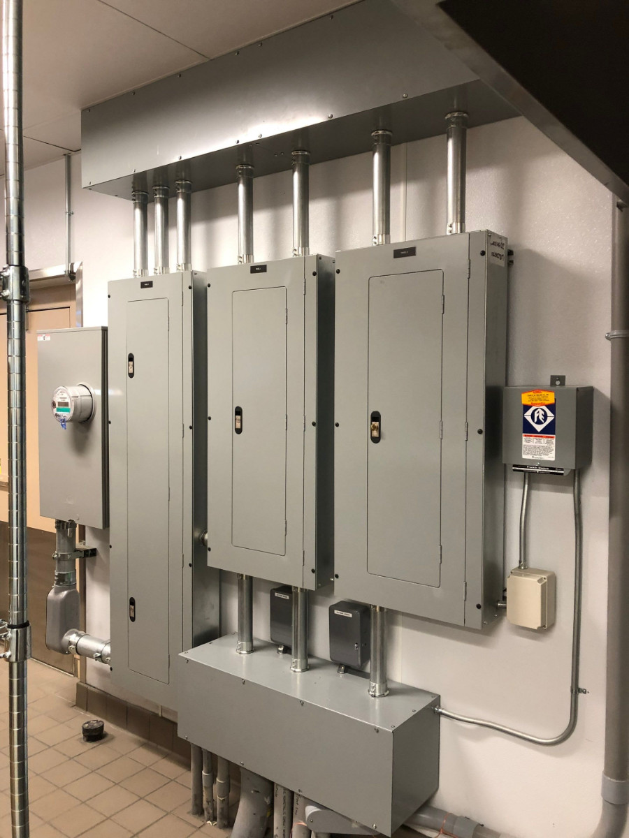 All Phase Electric LLC | Commercial panel board line-up with meter and conduit risers | Southern NH
